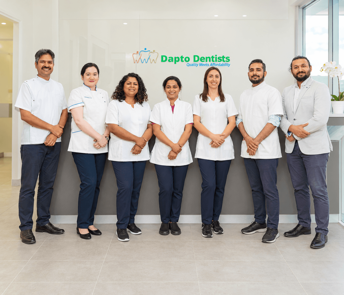 The Dapto Dentists team standing together in the clinic.